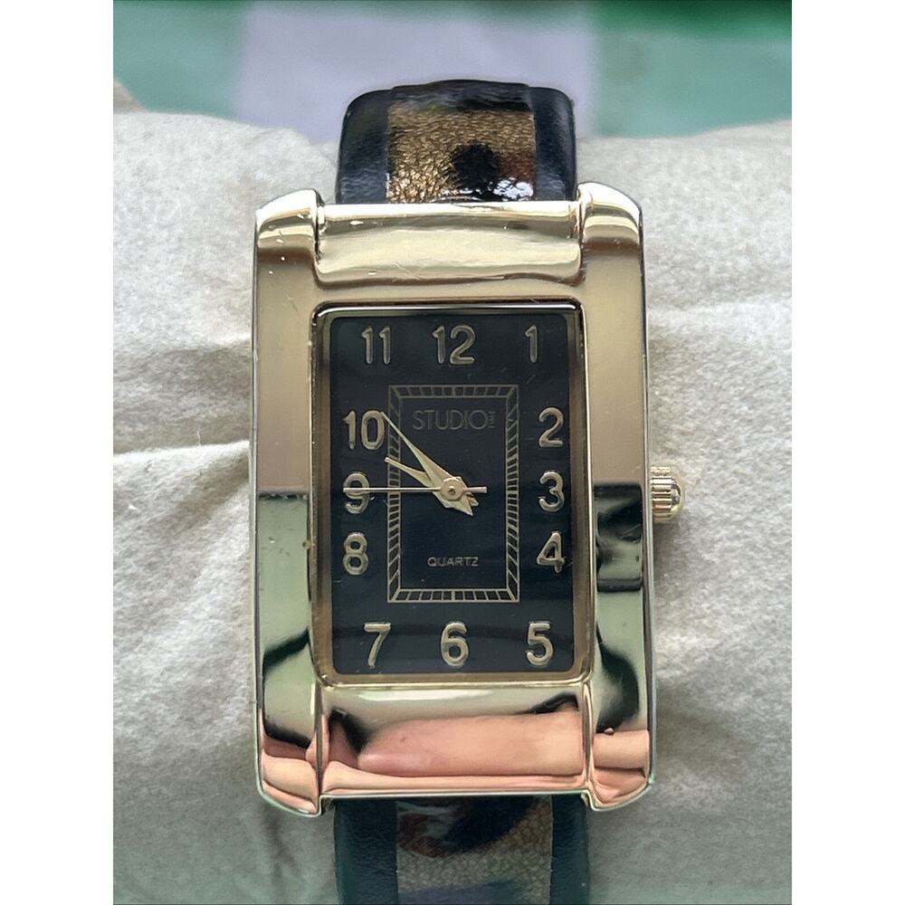 Studio Time Gold Tone Cheetah Print Band Women’s Cuff Watch